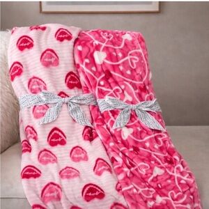 Juicy Couture Pink and Red Hearts Throws puck one each $25